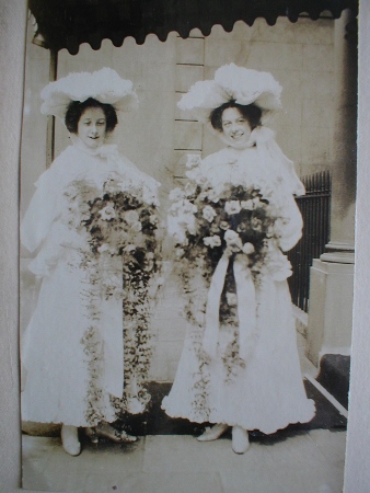 Esther and Sylia dressed as bridesmaids
